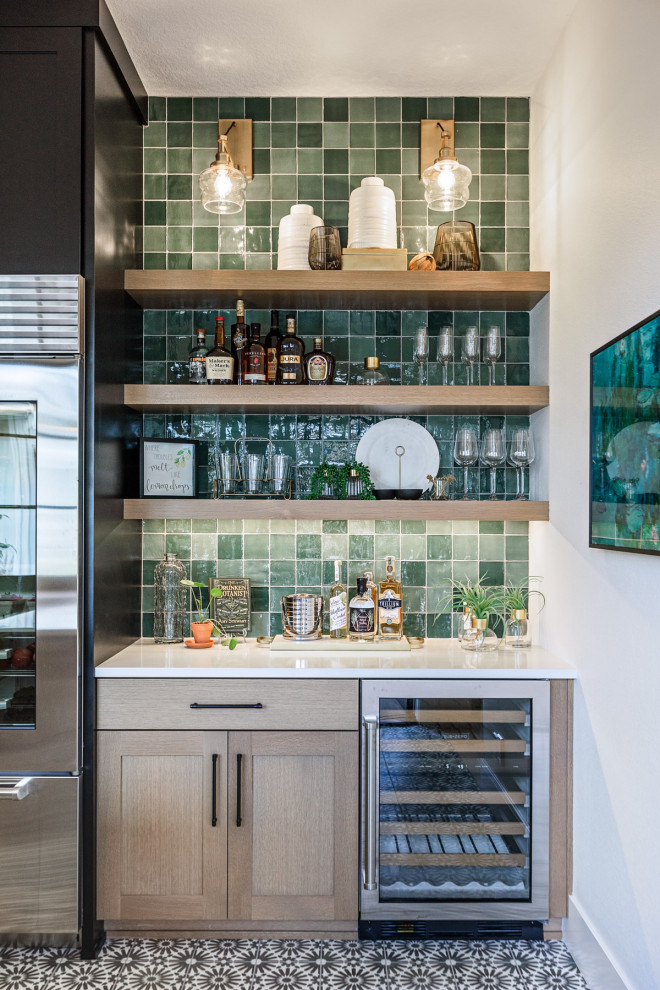 Design ideas for a small country single-wall home bar in Portland with no sink, shaker cabinets, light wood cabinets, green splashback, multi-coloured floor and white benchtop.
