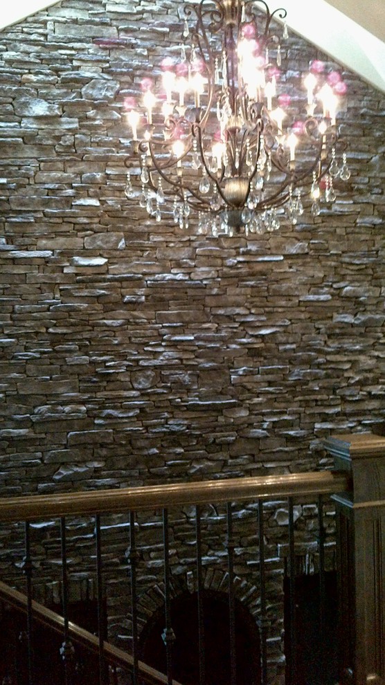 Inspiration for a large transitional wooden curved home design remodel in Toronto with wooden risers