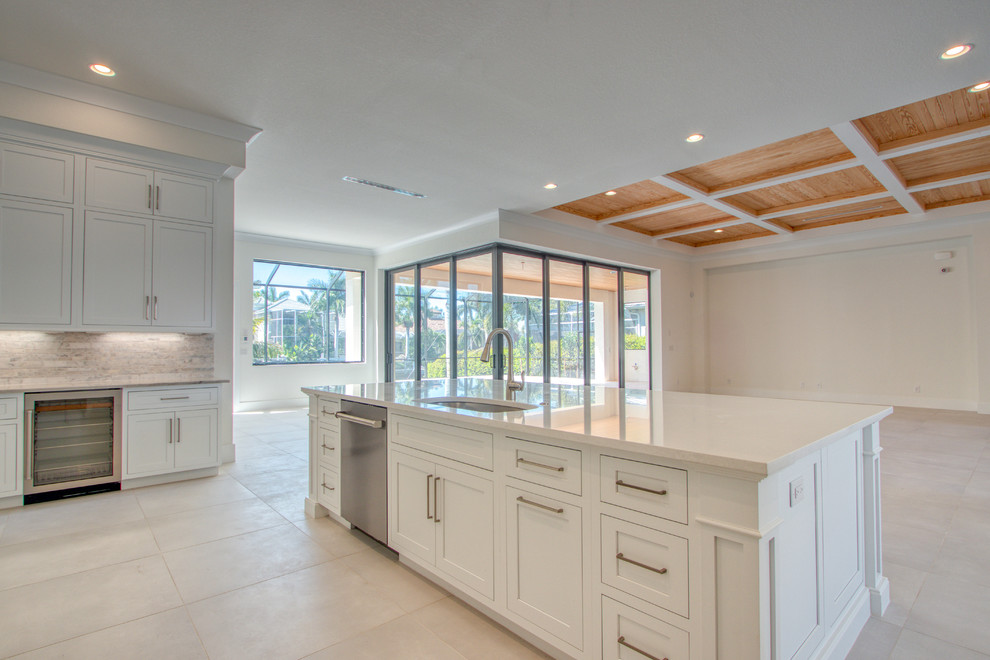 Example of a transitional home design design in Miami