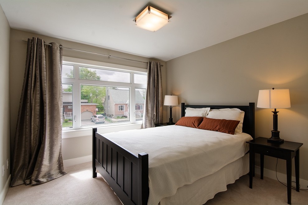 Example of a transitional bedroom design in Ottawa