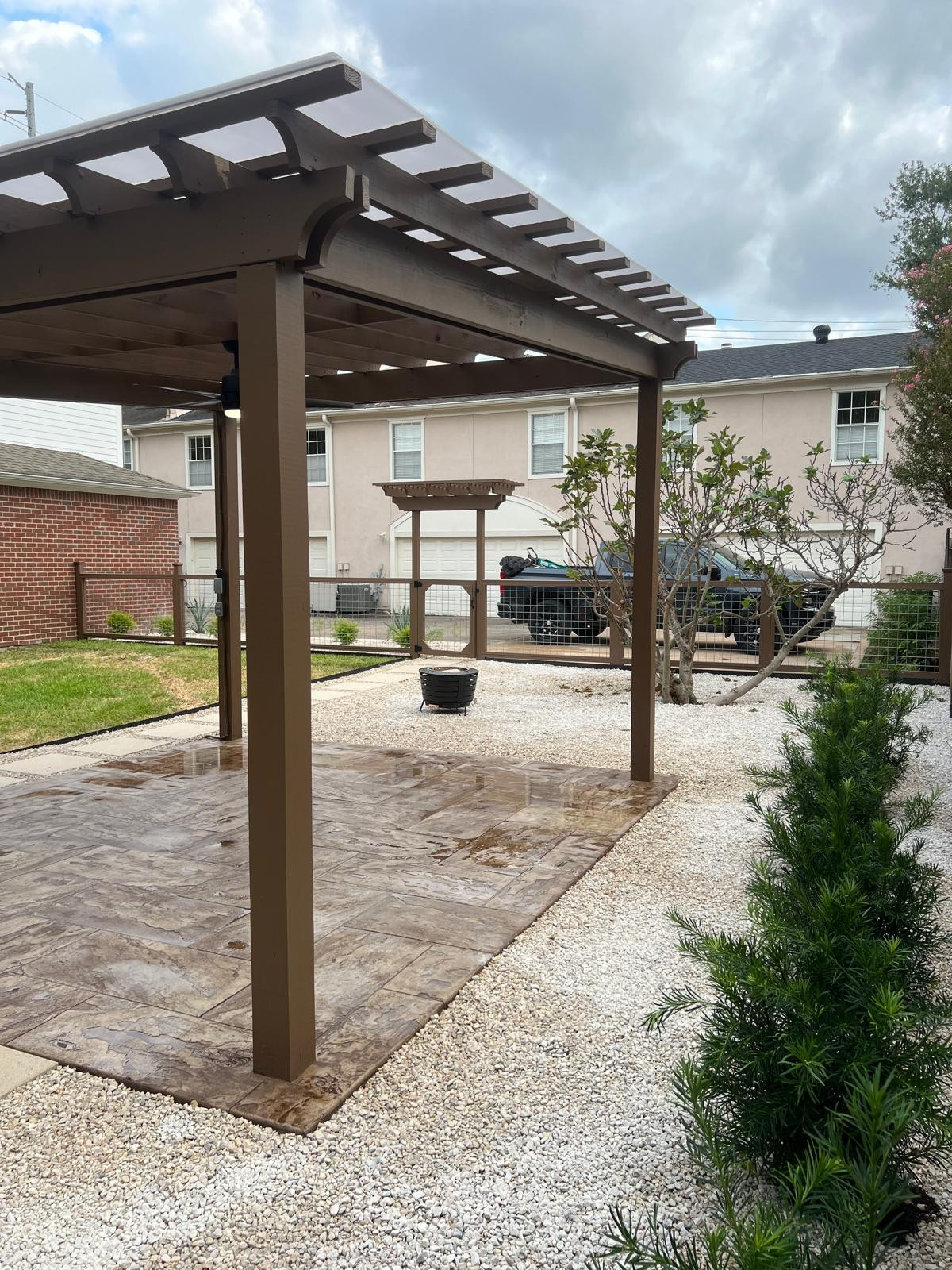 Beautiful stamped concrete patio with Pergola Cover on Haddon st!