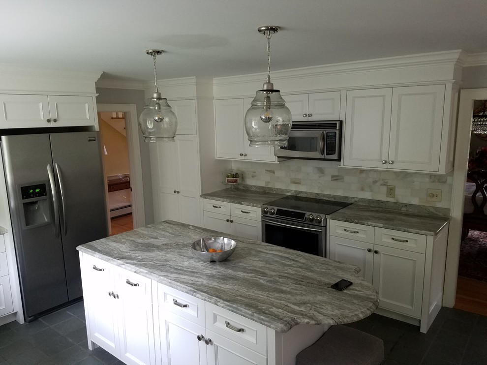 Eat-in kitchen - large transitional dark wood floor eat-in kitchen idea in Boston with recessed-panel cabinets, white cabinets, granite countertops, multicolored backsplash, subway tile backsplash, stainless steel appliances and an island
