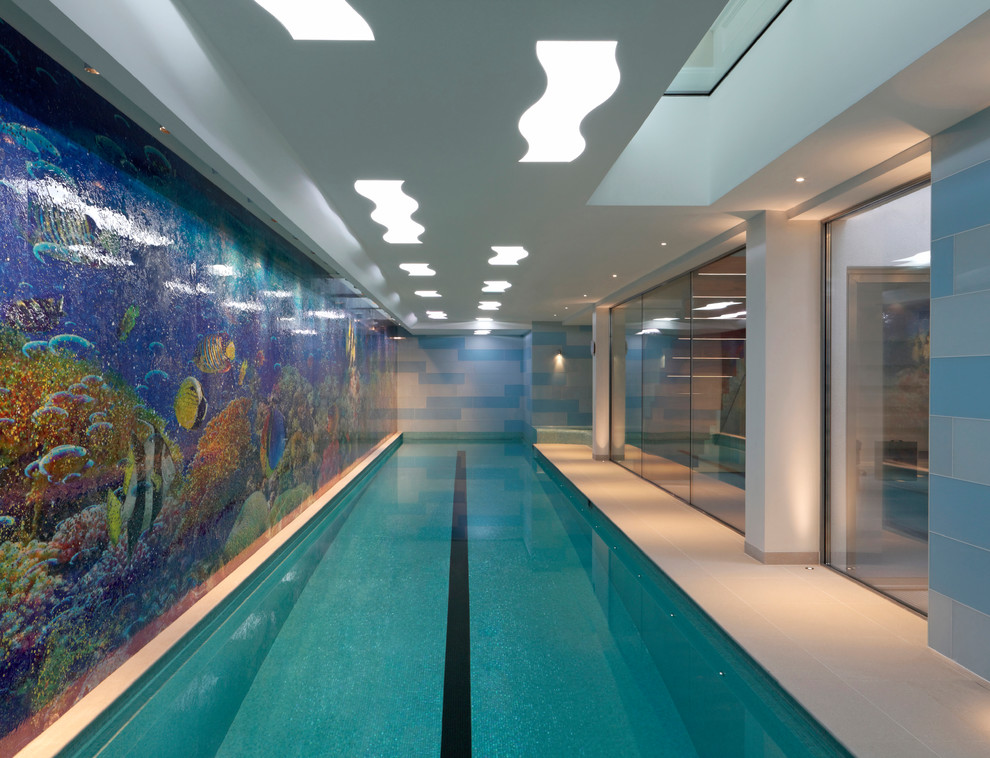 Design ideas for a contemporary indoor rectangular lap pool in London.