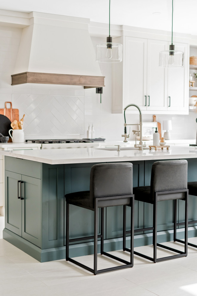 Example of a transitional kitchen design in Toronto