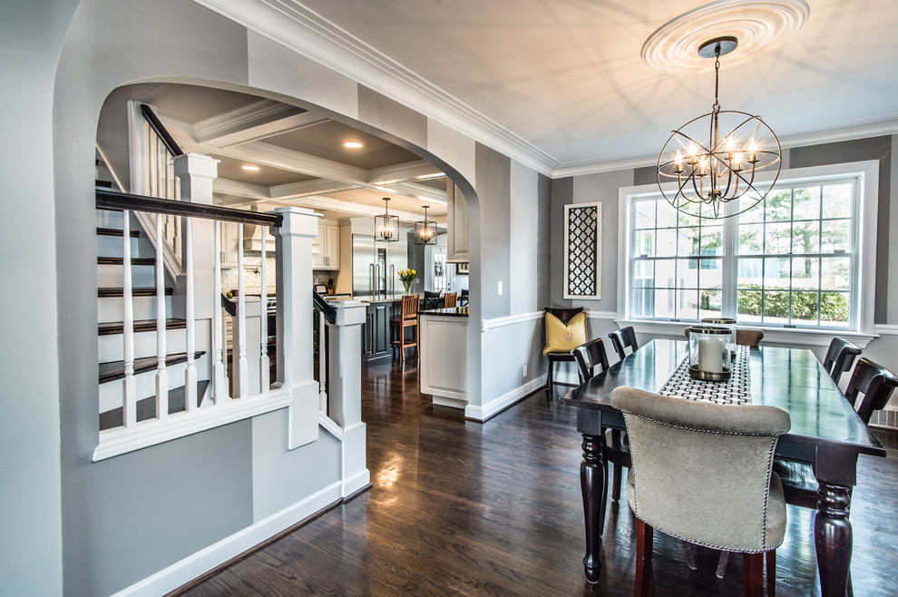 Inspiration for a large modern kitchen/dining combo in St Louis with grey walls and dark hardwood floors.