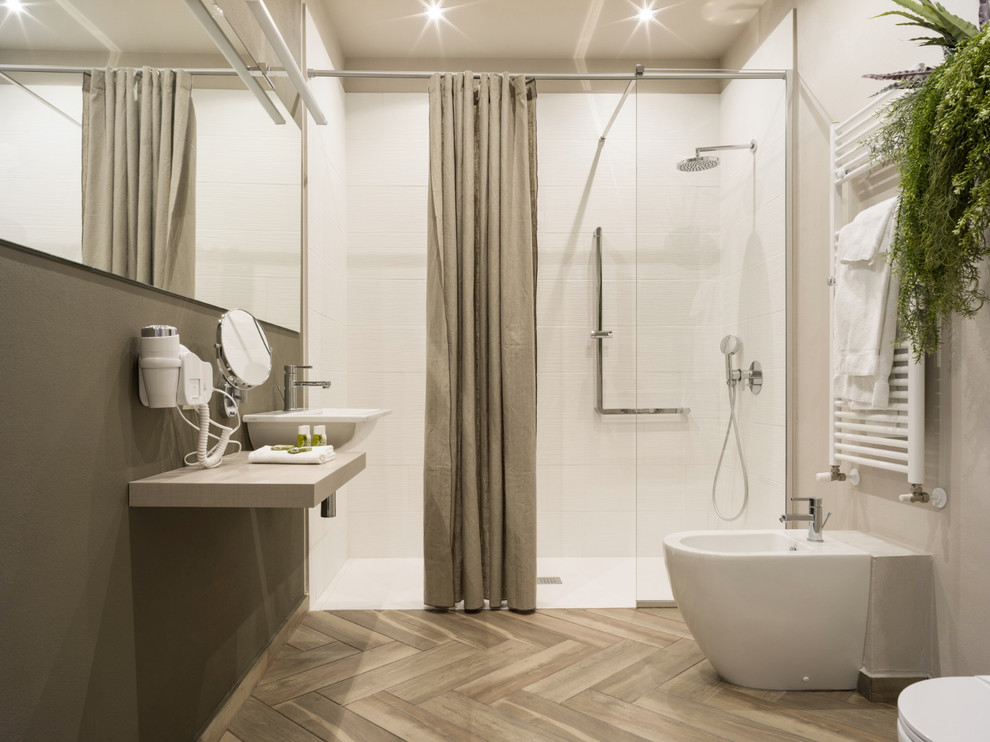 This is an example of a large contemporary 3/4 bathroom in Other with a curbless shower, a two-piece toilet, beige walls, porcelain floors, a console sink, brown floor and a shower curtain.