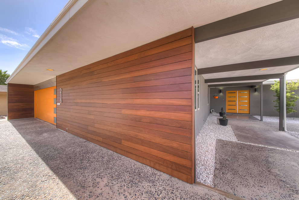 Inspiration for a midcentury one-storey grey house exterior in Las Vegas.