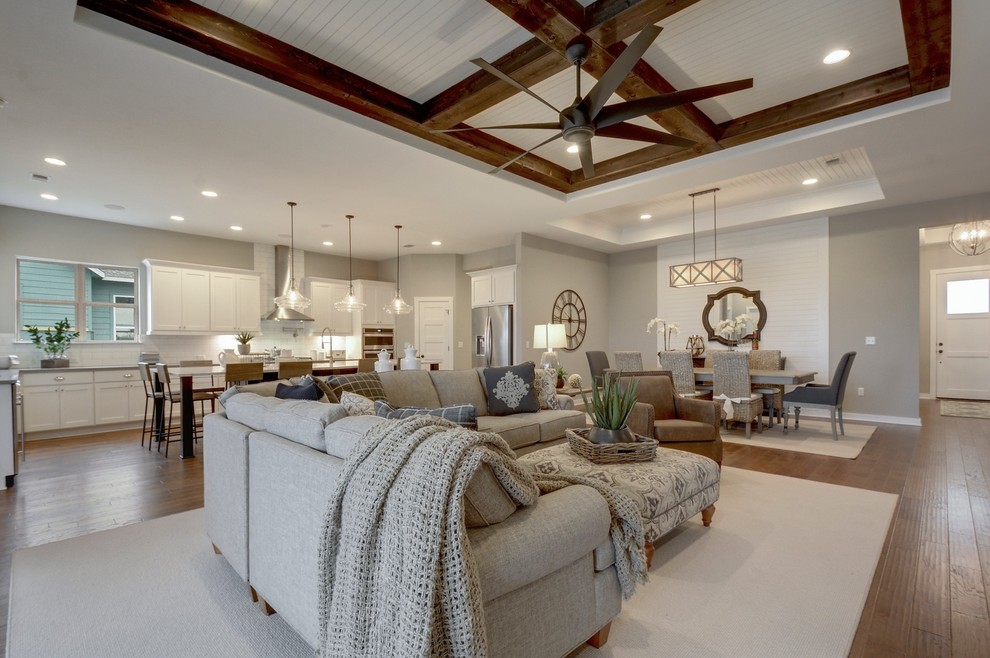 Transitional open concept living room in Jacksonville with grey walls, medium hardwood floors and brown floor.