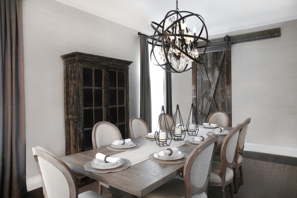 Example of a transitional dining room design in Toronto