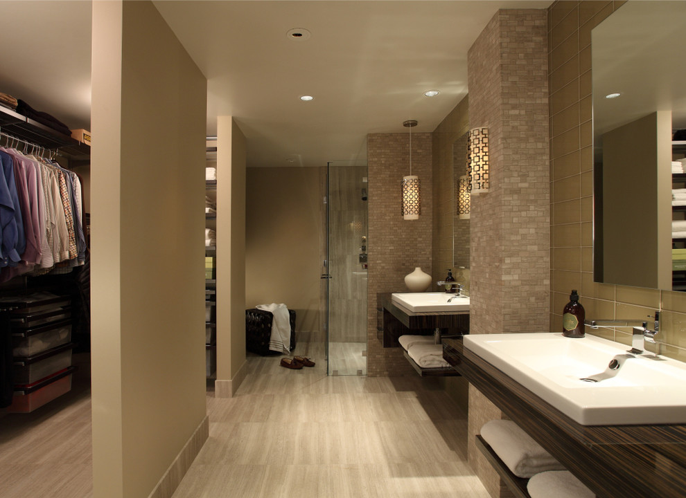 Inspiration for a contemporary bathroom in Atlanta with a drop-in sink, open cabinets, dark wood cabinets, wood benchtops, a curbless shower, beige tile, glass tile, beige walls and travertine floors.
