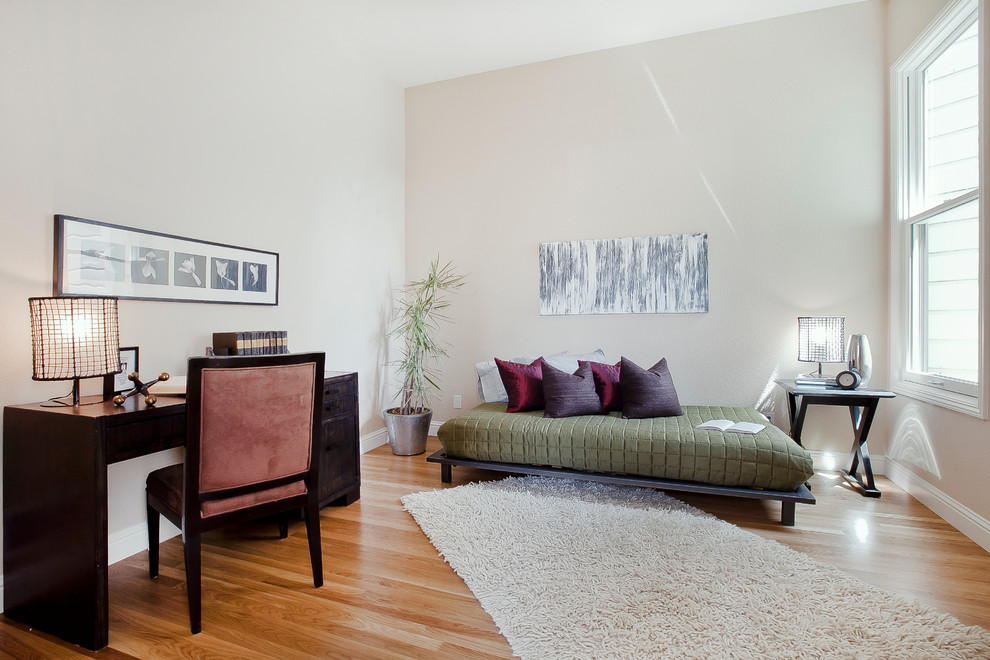 Inspiration for a modern guest medium tone wood floor bedroom remodel in San Francisco