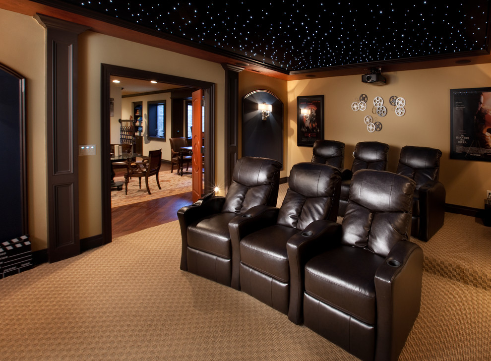 Traditional enclosed home theatre in Columbus with beige floor.
