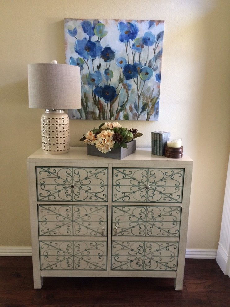 Example of a transitional entryway design with beige walls