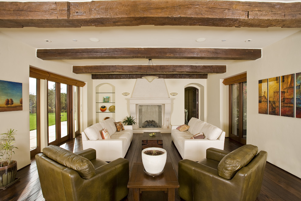 Inspiration for a country living room in San Francisco with white walls and dark hardwood floors.