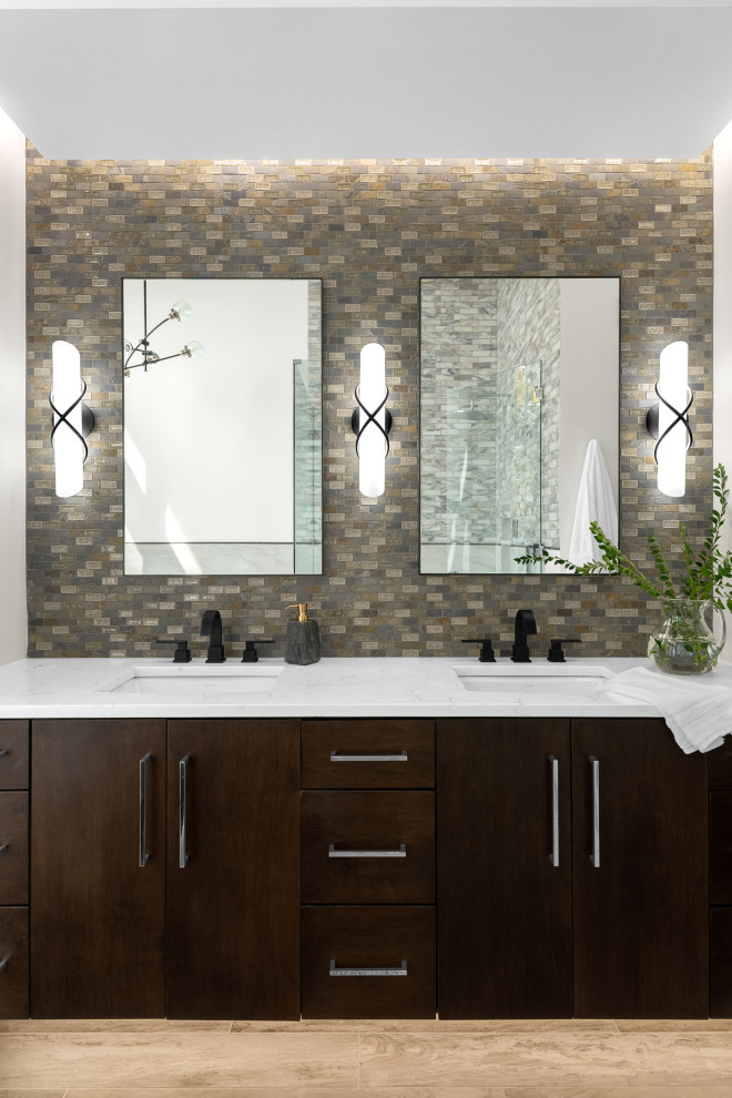 Photo of a mid-sized country master bathroom in Nashville with flat-panel cabinets, dark wood cabinets, white tile, stone tile, white walls, ceramic floors, an undermount sink, quartzite benchtops, beige floor and white benchtops.