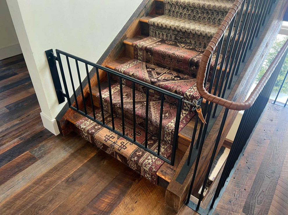 Staircase - rustic wooden l-shaped metal railing staircase idea with wooden risers