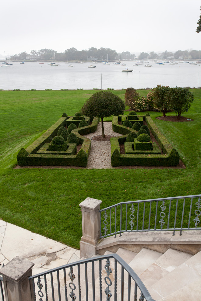 Inspiration for a large traditional backyard full sun formal garden for summer in New York.