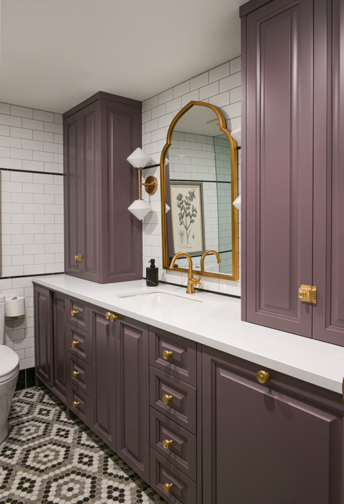 This is an example of a mid-sized traditional 3/4 bathroom in Vancouver with raised-panel cabinets, purple cabinets, an alcove shower, a two-piece toilet, white tile, subway tile, white walls, mosaic tile floors, an undermount sink, engineered quartz benchtops, multi-coloured floor, a hinged shower door, white benchtops, a shower seat, a single vanity, a built-in vanity and brick walls.