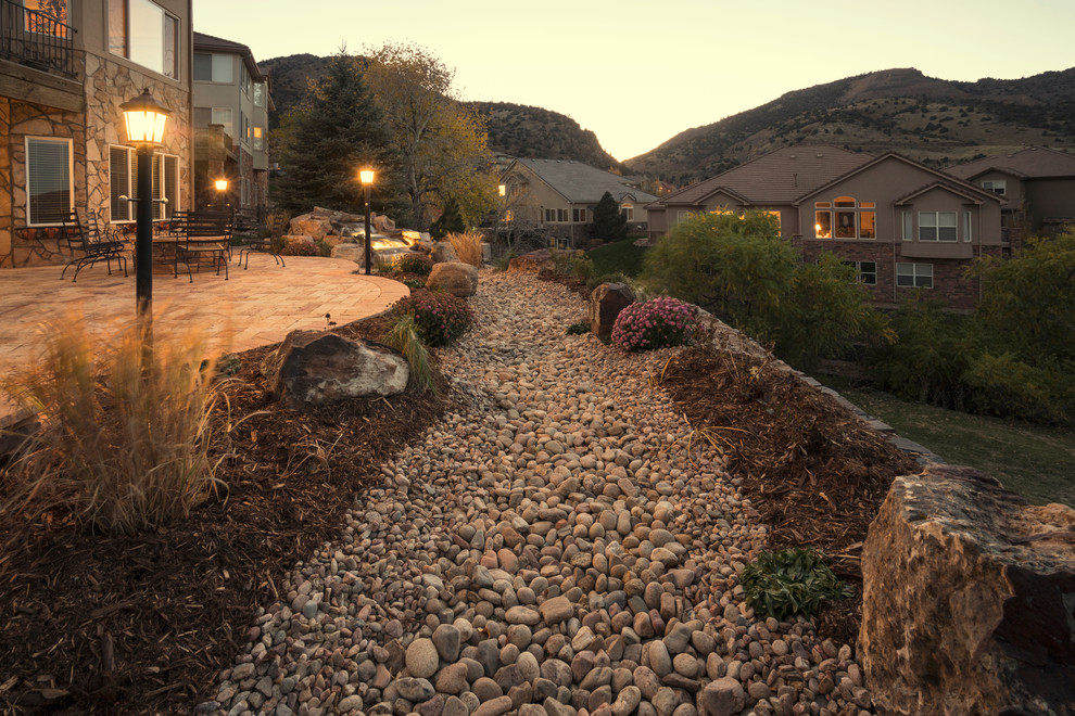 Inspiration for a rustic landscaping in Denver.