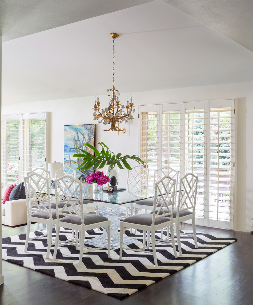 Photo of an eclectic open plan dining in Denver with white walls and dark hardwood floors.