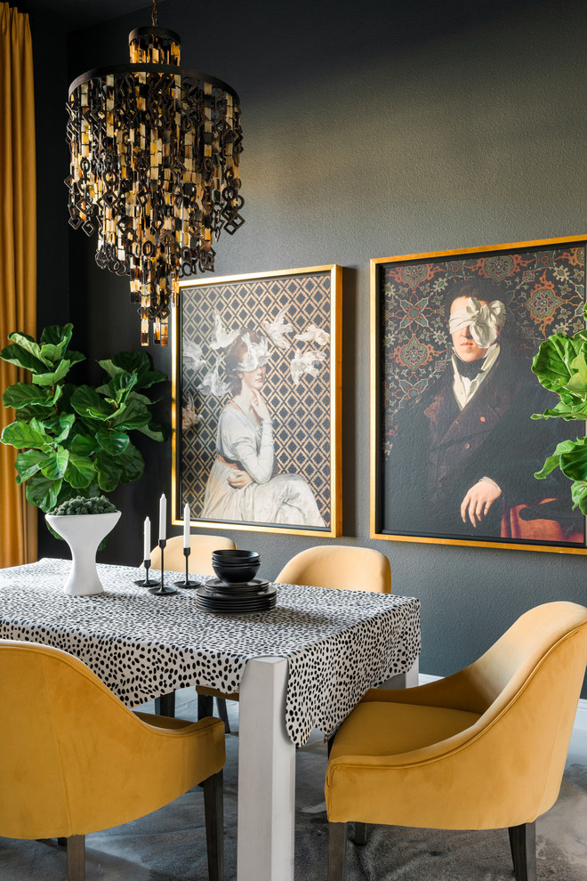 Photo of an eclectic separate dining room in Chicago with black walls.