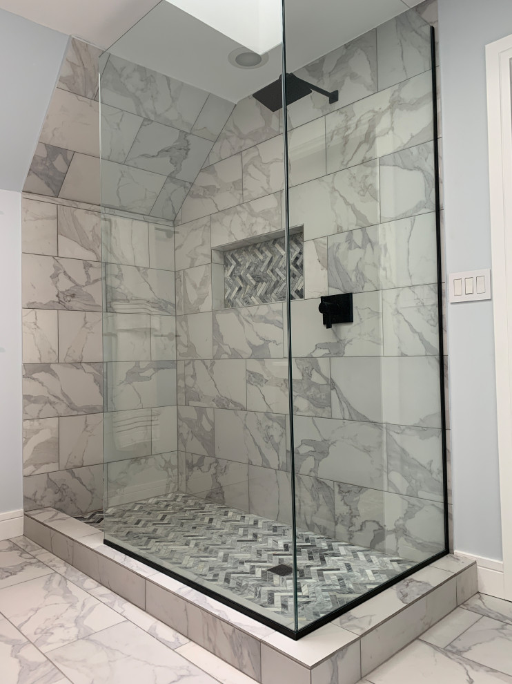 Inspiration for a medium sized classic ensuite bathroom in Chicago with flat-panel cabinets, brown cabinets, a walk-in shower, a one-piece toilet, white tiles, porcelain tiles, blue walls, porcelain flooring, a built-in sink, quartz worktops, white floors, an open shower, white worktops, a single sink and a floating vanity unit.