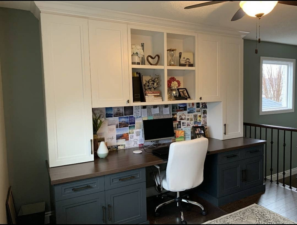 Home office - built-in desk home office idea in Toronto