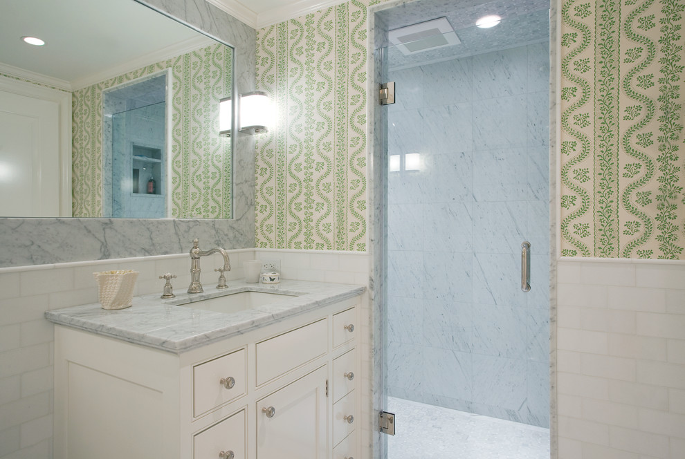 Inspiration for a small traditional 3/4 bathroom in Boston with beaded inset cabinets, white cabinets, marble benchtops, white tile and stone tile.