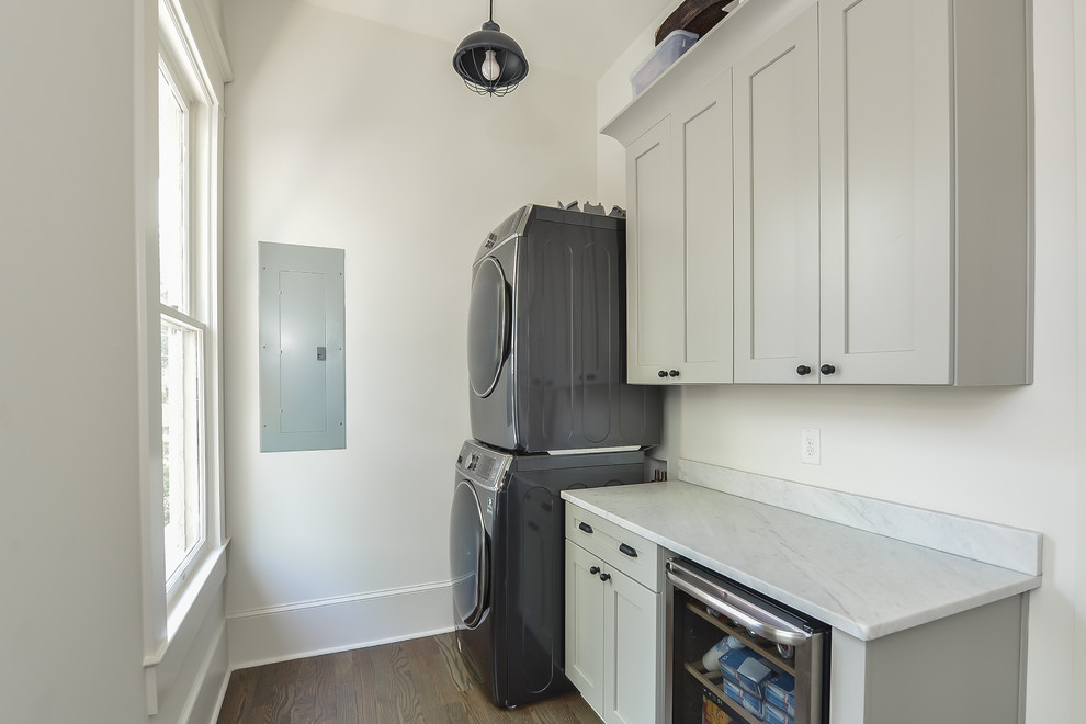 This is an example of a transitional laundry room in Atlanta.