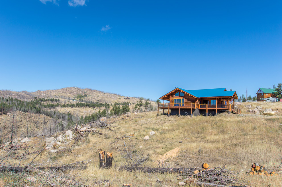 Inspiration for a rustic home design remodel in Denver