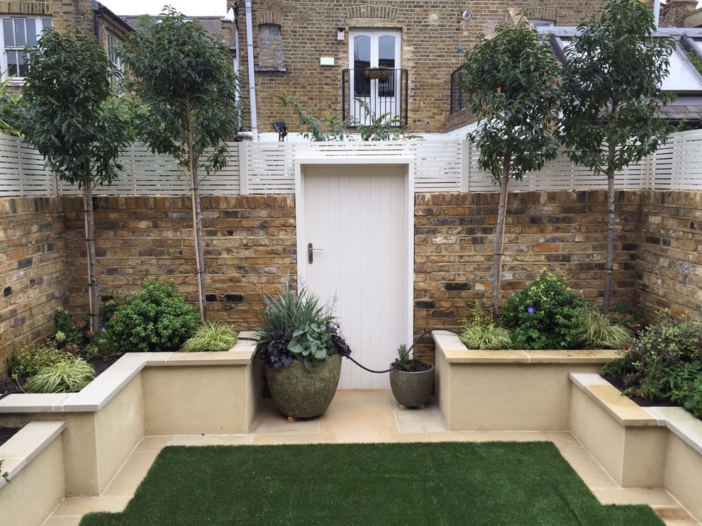 Design ideas for a small contemporary backyard garden in London.