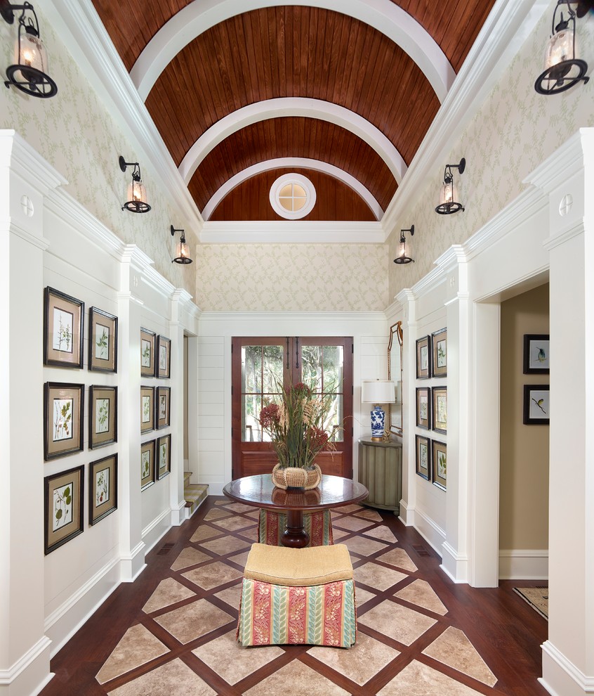 Photo of a traditional entry hall in Charleston with a double front door and a glass front door.