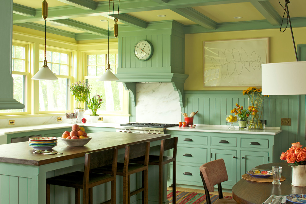 This is an example of a country l-shaped eat-in kitchen in Boston with beaded inset cabinets, turquoise cabinets, stainless steel appliances and with island.