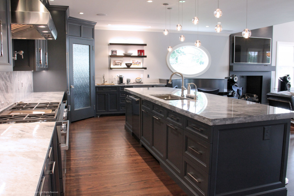 Open concept kitchen - large transitional single-wall medium tone wood floor open concept kitchen idea with a double-bowl sink, recessed-panel cabinets, gray cabinets, marble countertops, multicolored backsplash, stainless steel appliances, an island and marble backsplash
