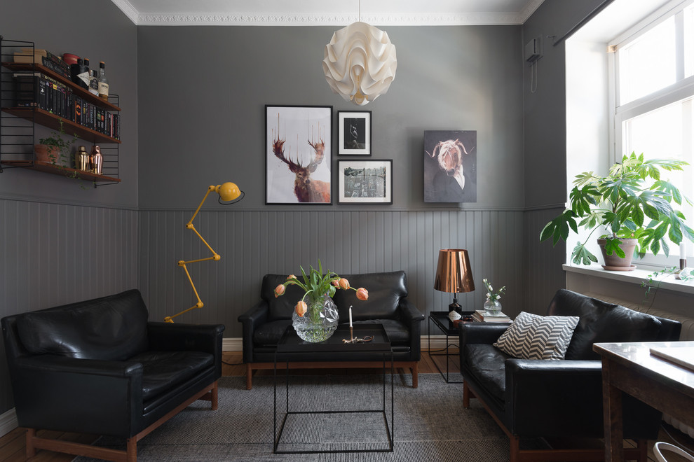Mid-sized scandinavian enclosed living room in Gothenburg with grey walls, no fireplace, no tv and a home bar.