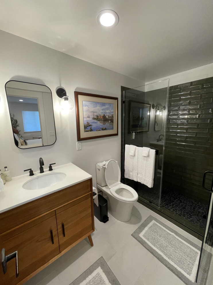 Modern Bathroom Transformation with Custom Tile Shower.