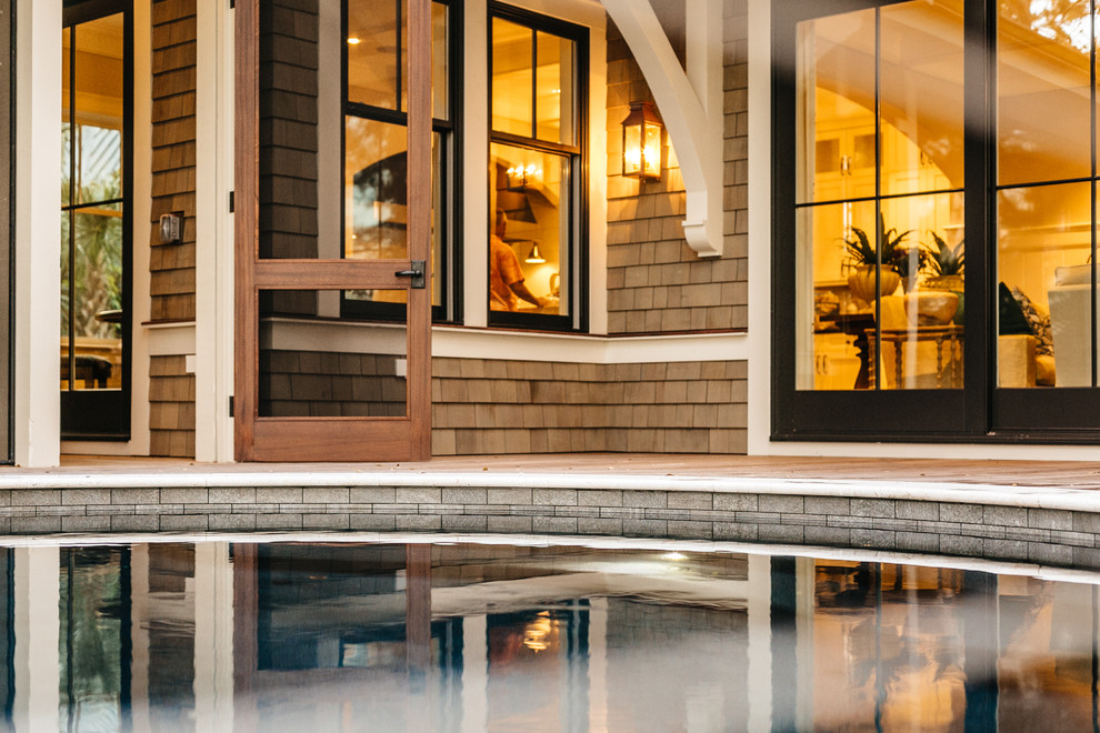 Inspiration for a large transitional backyard deck remodel in Charleston with no cover