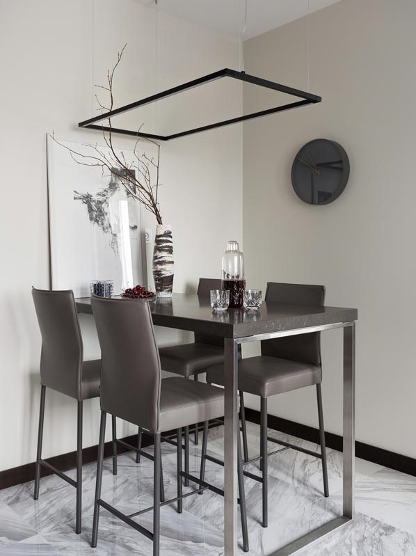 Small contemporary dining room in Moscow with white walls, ceramic floors and grey floor.