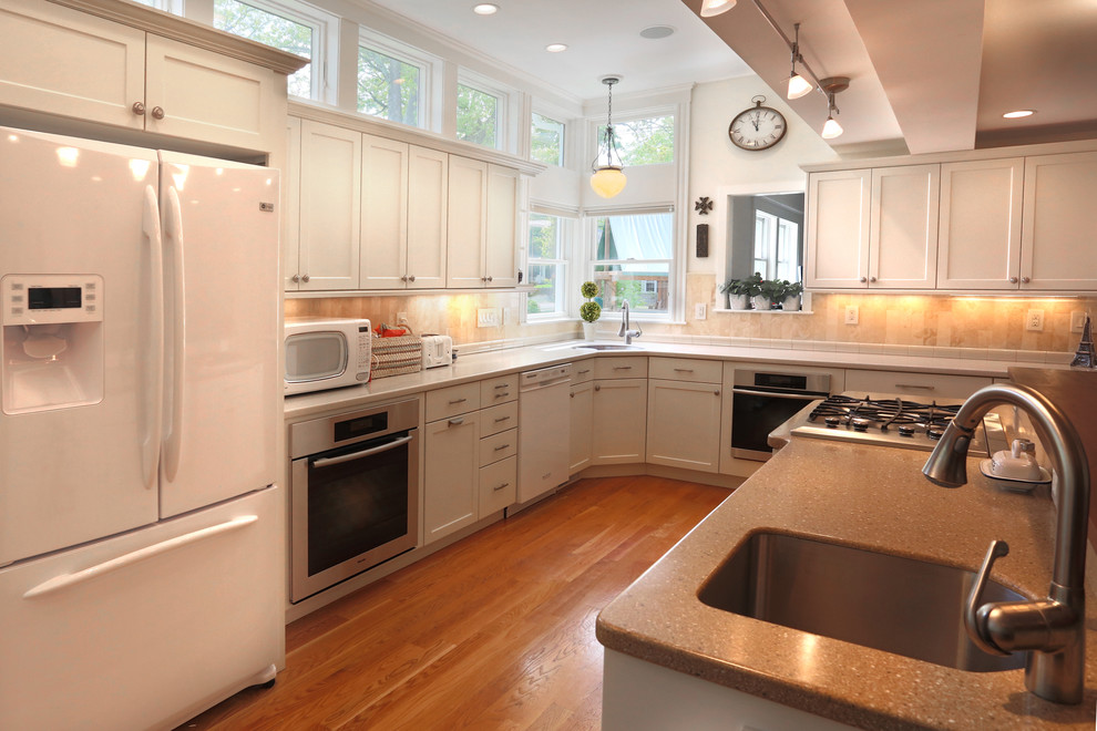 Example of a transitional kitchen design in Boston