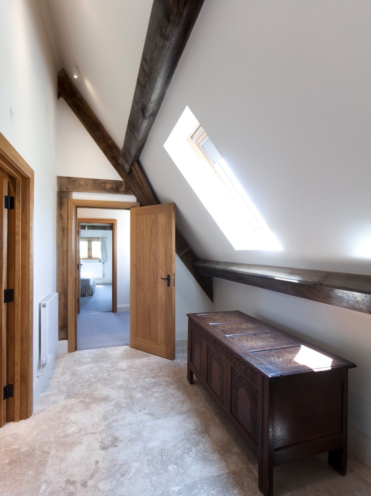 Design ideas for a contemporary hallway in Gloucestershire with white walls.