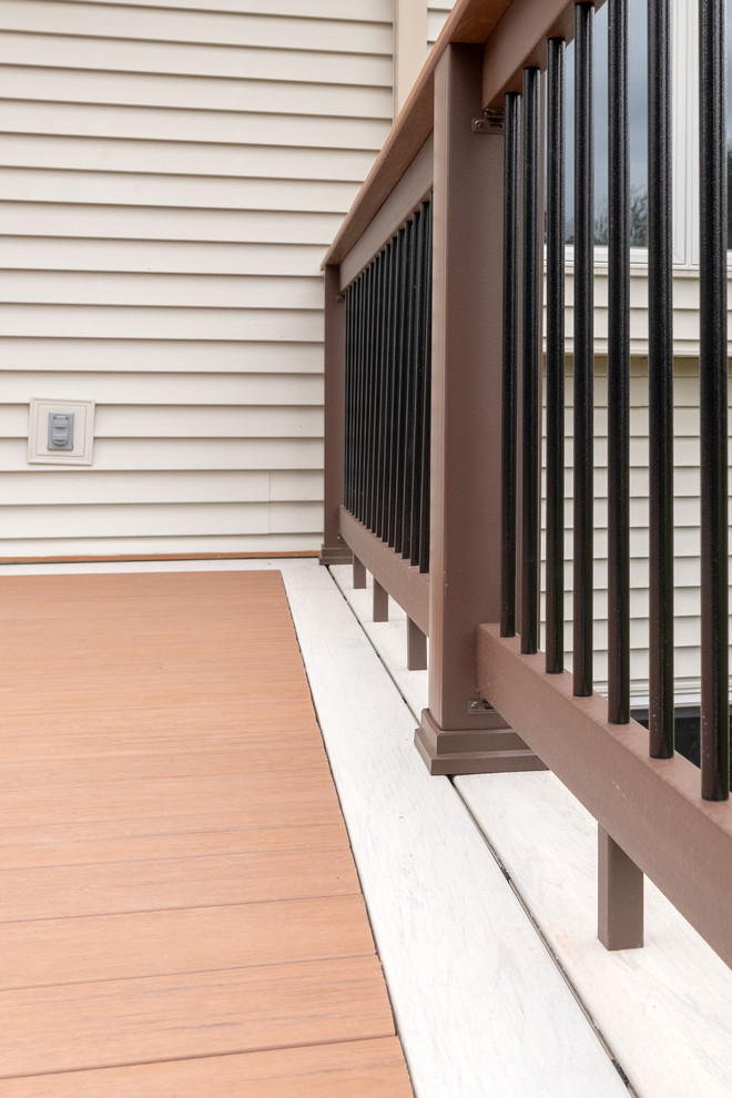 Inspiration for a mid-sized transitional backyard home design remodel with no cover