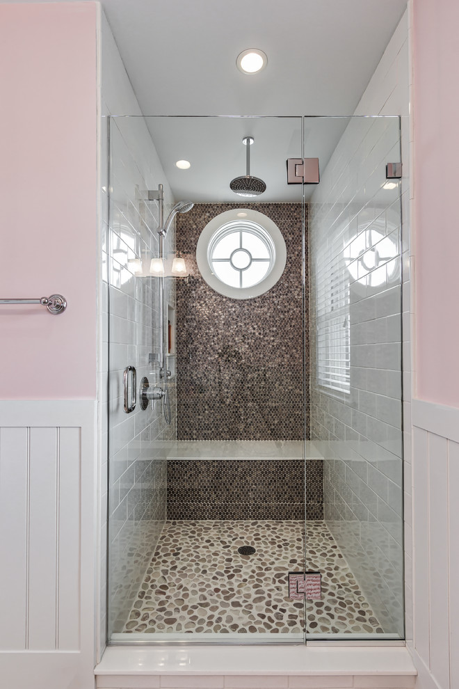 Design ideas for a mid-sized beach style kids bathroom in Philadelphia with furniture-like cabinets, an alcove shower, beige tile, mosaic tile, pink walls, ceramic floors, a vessel sink and granite benchtops.