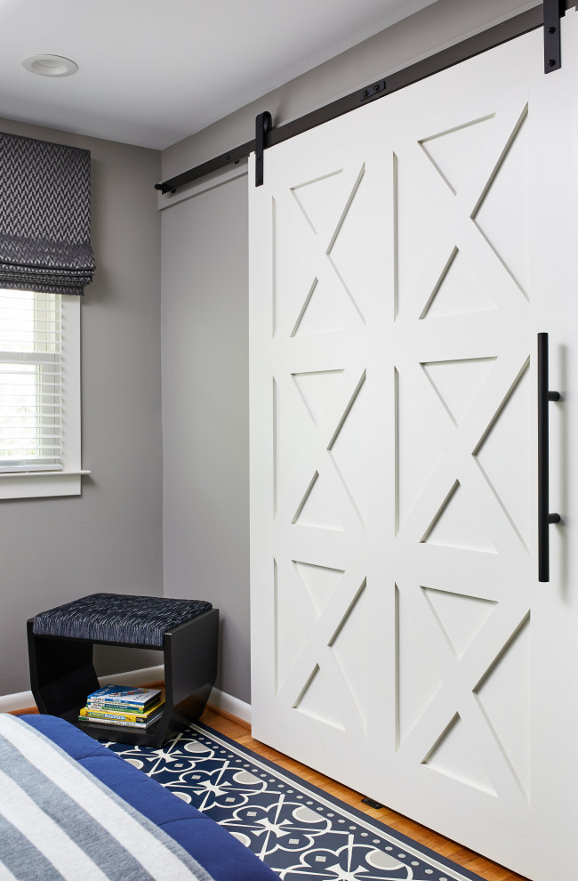 #mcleanrenovation - This room for three growing boys now gives each of them a private area of their own for sleeping, studying, and displaying their prized possessions.  By arranging the beds this way, we were also able to gain a second (much needed) closet/ wardrobe space.  Painting the floors gave the idea of a fun rug being there, but without shifting around and getting destroyed by the boys.