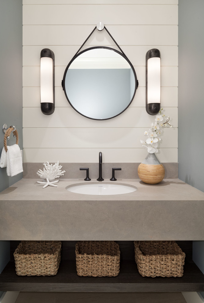Photo of a beach style powder room in Vancouver.