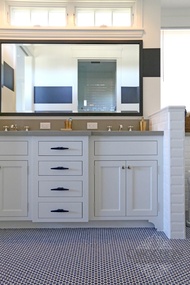 This is an example of a mid-sized beach style bathroom in San Diego with shaker cabinets, white cabinets, marble benchtops, blue tile, mosaic tile, a freestanding tub, an alcove shower, a two-piece toilet, an undermount sink, white walls and mosaic tile floors.