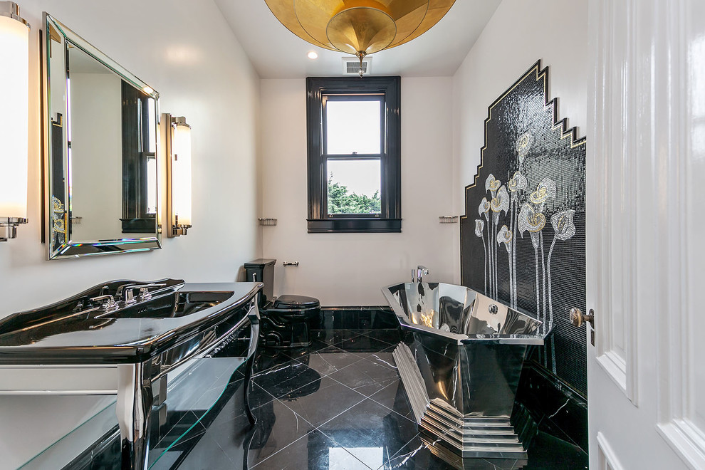 Photo of a traditional bathroom in San Francisco with a freestanding tub, a two-piece toilet, black tile, white walls, a console sink, black floor and black benchtops.