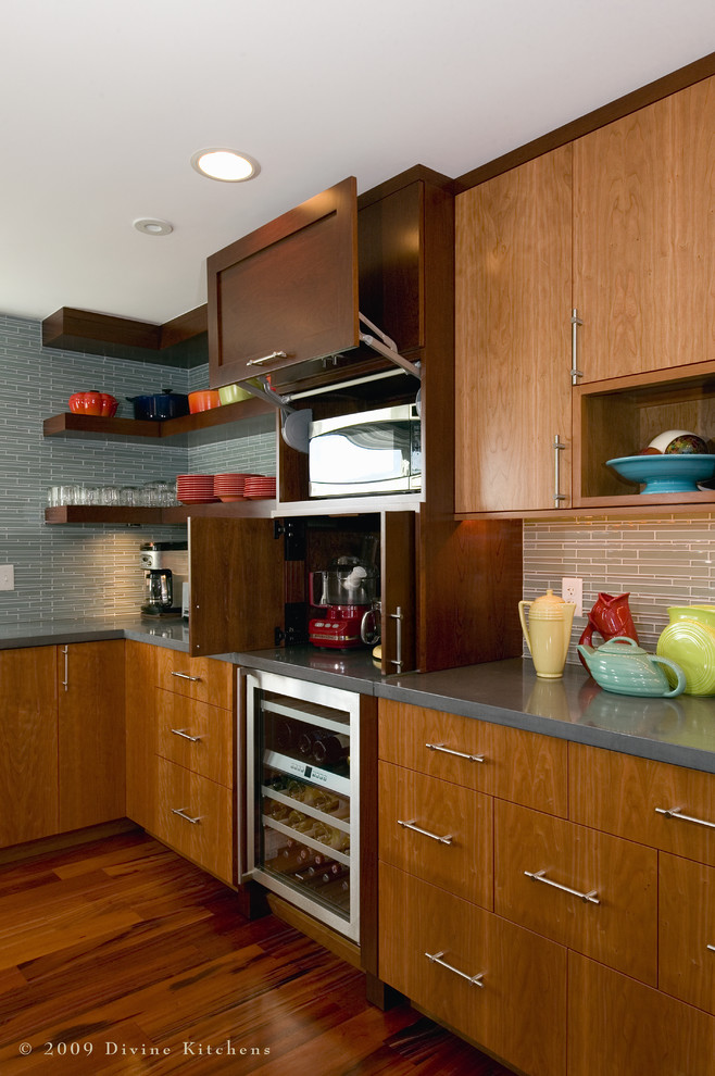 Photo of an expansive contemporary u-shaped eat-in kitchen in Boston with open cabinets, dark wood cabinets, concrete benchtops, stainless steel appliances, an undermount sink, dark hardwood floors and with island.
