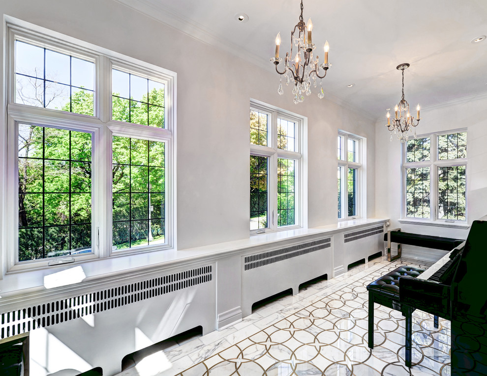 This is an example of a large traditional sunroom in Montreal with marble floors, no fireplace and a standard ceiling.