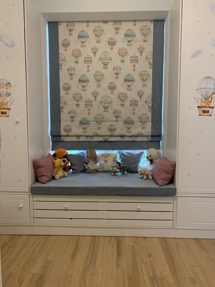 This is an example of a mid-sized contemporary kids' bedroom for kids 4-10 years old and girls in Moscow.