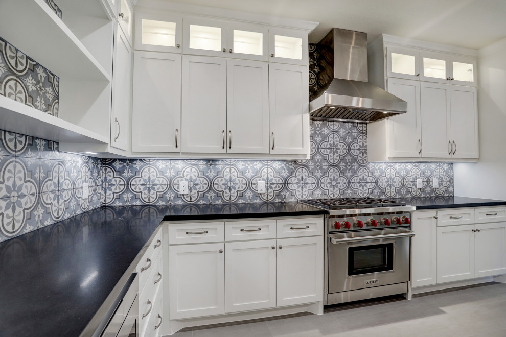 Example of a transitional kitchen design in Houston